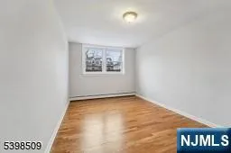 an empty room with a bench