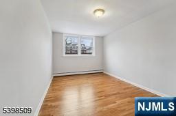 357 Franklin Street Bloomfield, NJ 07003 - Photo 13 of 17 an empty room with a bench