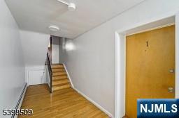 357 Franklin Street Bloomfield, NJ 07003 - Photo 15 of 17 a view of a hallway with wooden floor