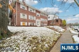 357 Franklin Street Bloomfield, NJ 07003 - Photo 2 of 17 a street view with tall buildings