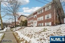 357 Franklin Street Bloomfield, NJ 07003 - Photo 3 of 17 a street view covered with snow