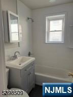 357 Franklin Street Bloomfield, NJ 07003 - Photo 6 of 17 a bathroom with a sink toilet and tub
