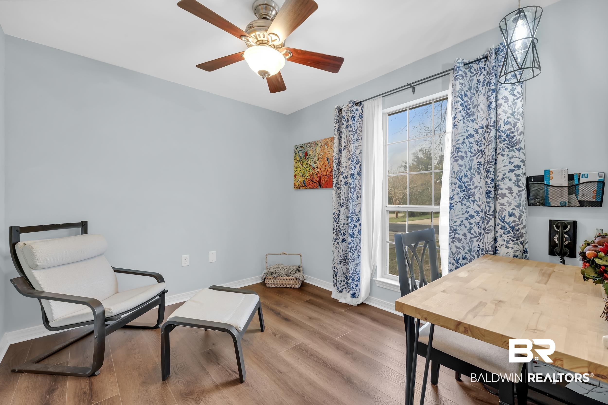 191 Robbins Boulevard Daphne, AL 36526 - Photo 15 of 24 Sitting room with wood finished floors and ceiling fan