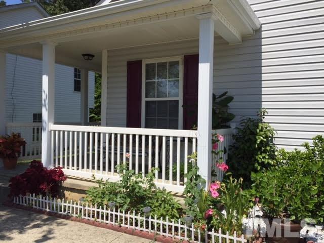 4708 Silverdene Street Raleigh, NC 27616 - Photo 1 of 14 a porch with seating space