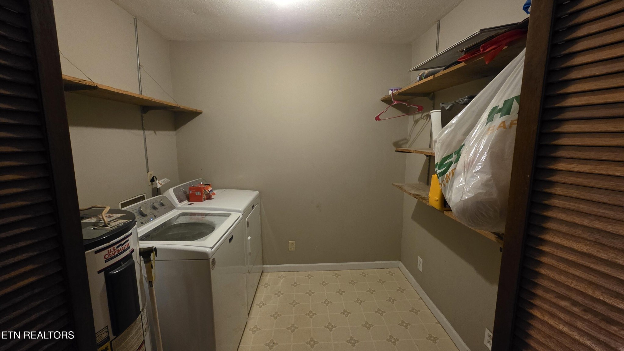 992 Walden Ridge Lane Caryville, TN 37714 - Photo 26 of 58 a utility room with dryer and washer