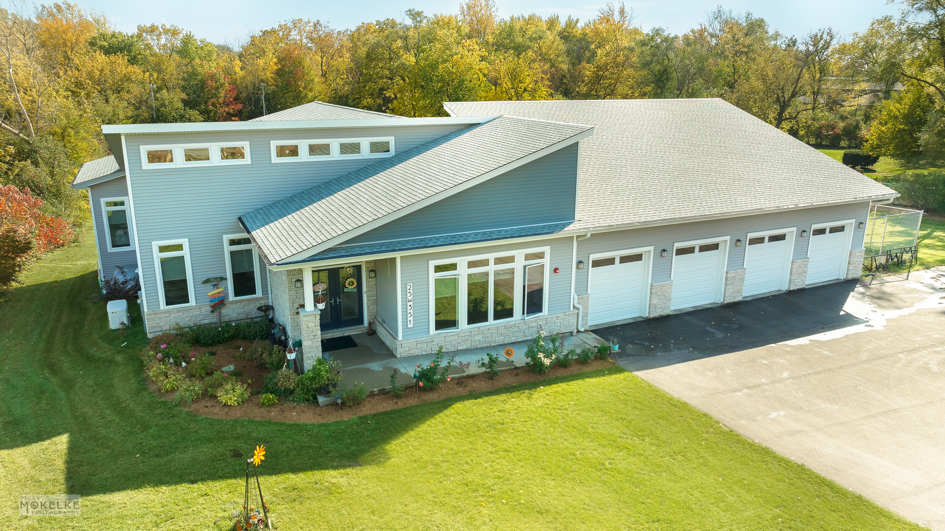 25W351 Plank Road Naperville, IL 60563 - Photo 1 of 1 a front view of a house with a yard
