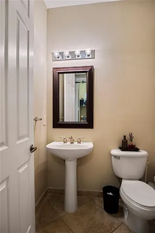 a utility room with sink dryer and washer