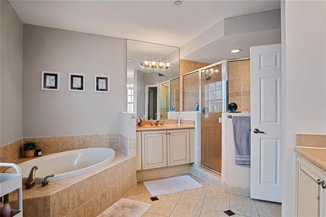 a bedroom with bed and a window