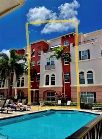 a front view of a multi story residential apartment building