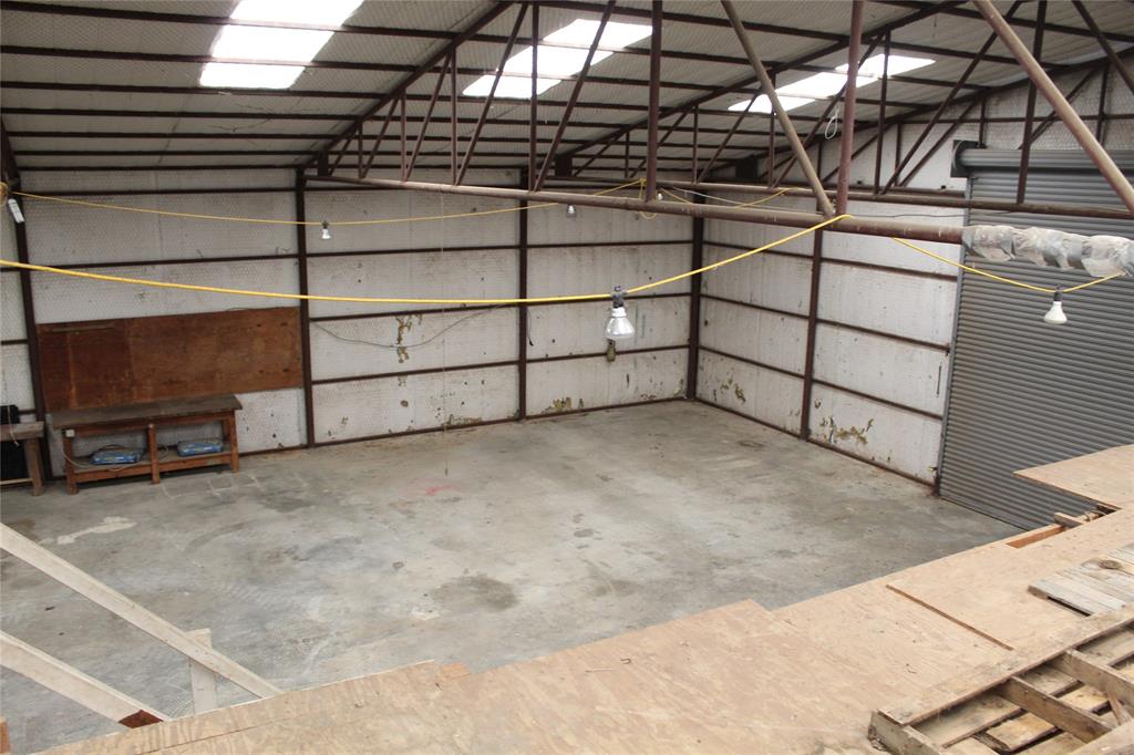 278 County Road 4460 Decatur, TX 76234 - Photo 16 of 19 a view of a room with racks on the wall