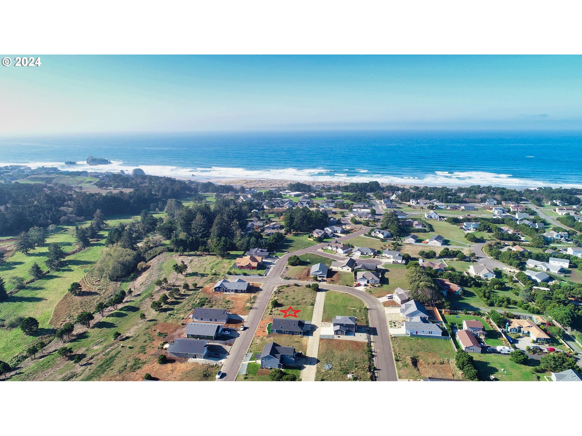 848 Seacrest Drive Bandon, OR 97411 - Photo 3 of 24 an aerial view of multiple house