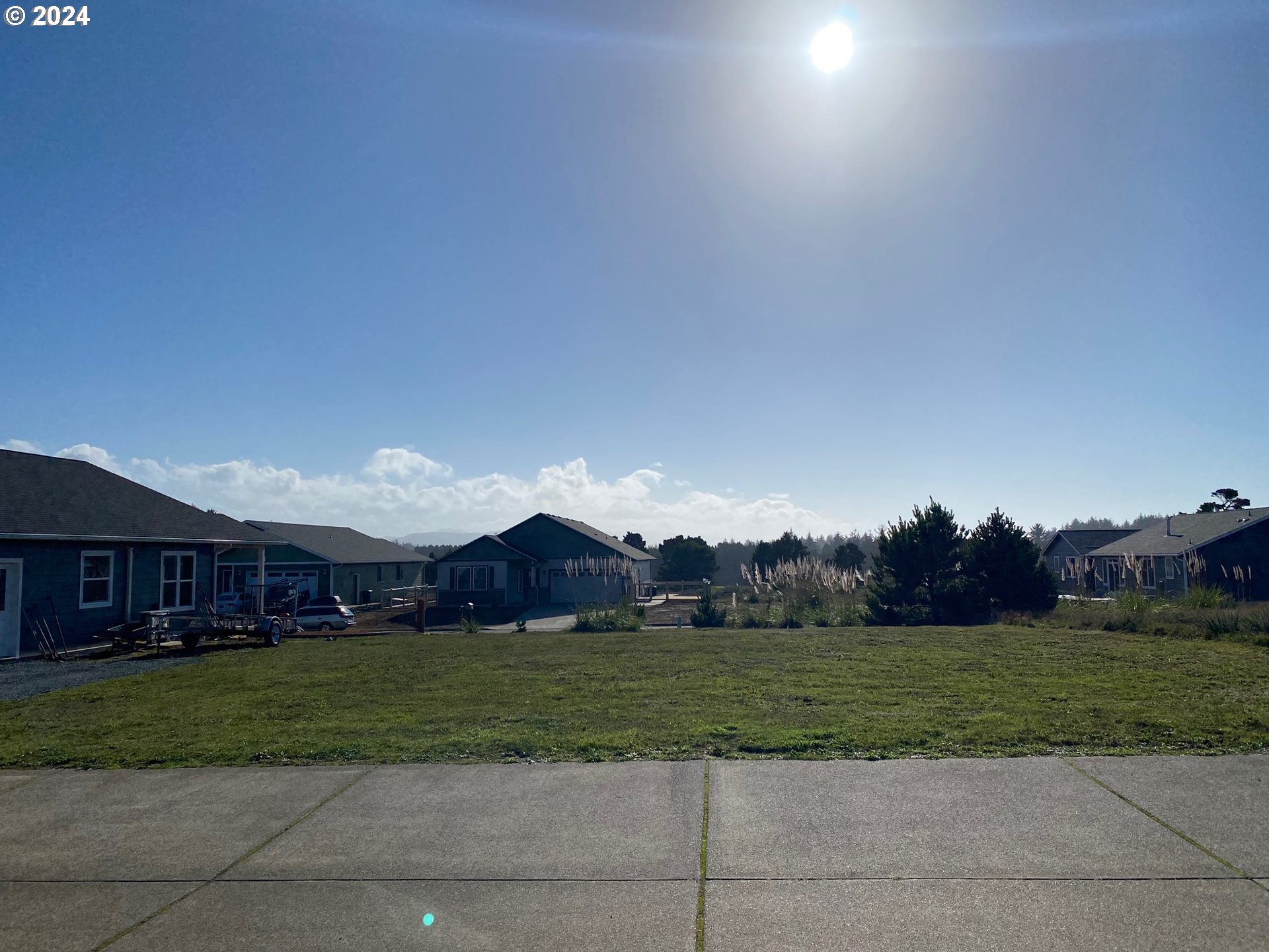 848 Seacrest Drive Bandon, OR 97411 - Photo 7 of 24 a view of house with a big yard