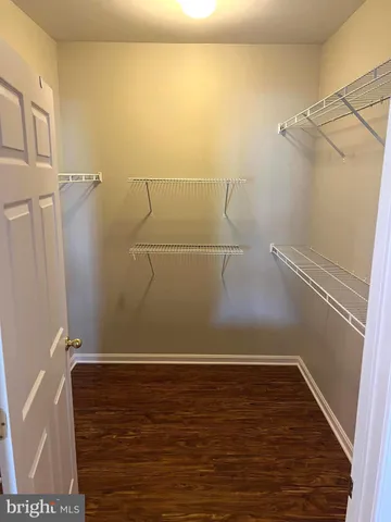 a view of a room with racks on the wall