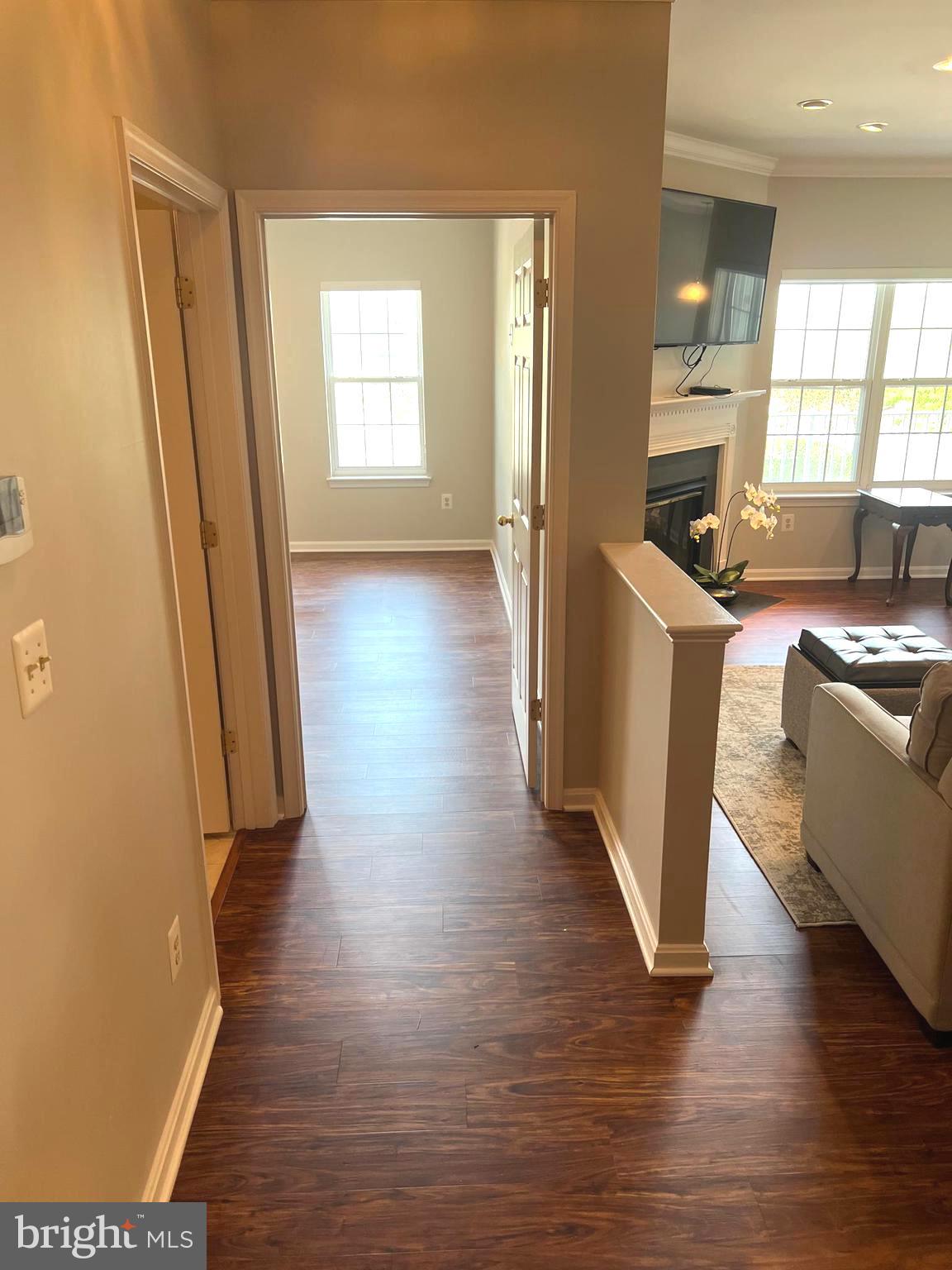 431 Hopkins Landing Drive, Unit 431 Baltimore, MD 21221 - Photo 2 of 30 a view of a living room and hardwood floor