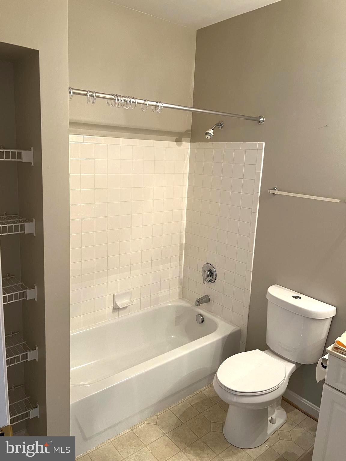 431 Hopkins Landing Drive, Unit 431 Baltimore, MD 21221 - Photo 24 of 30 a bathroom with a toilet and a bathtub