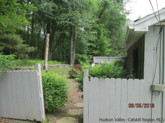 309 Schroon Hill Road Kerhonkson, NY 12446 - Photo 16 of 21 a view of a pathway of a park
