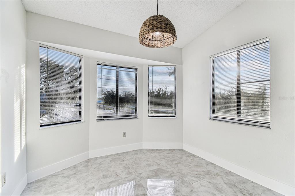 1734 Rumar Lane, Unit A Holiday, FL 34691 - Photo 51 of 100 a view of an empty room with a window