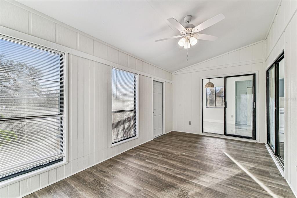 1734 Rumar Lane, Unit A Holiday, FL 34691 - Photo 56 of 100 a view of an empty room with cabinet and a window