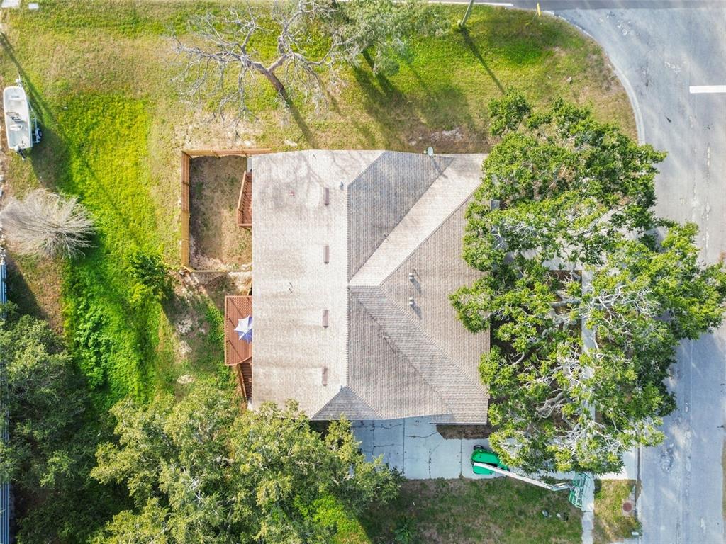 1734 Rumar Lane, Unit A Holiday, FL 34691 - Photo 100 of 100 an aerial view of a house with a yard