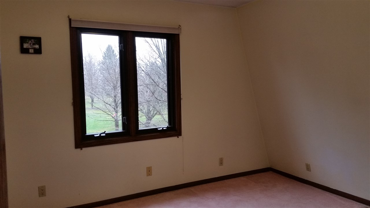 353 Cummings Road Caledonia, IL 61011 - Photo 17 of 24 a view of a small space with a window