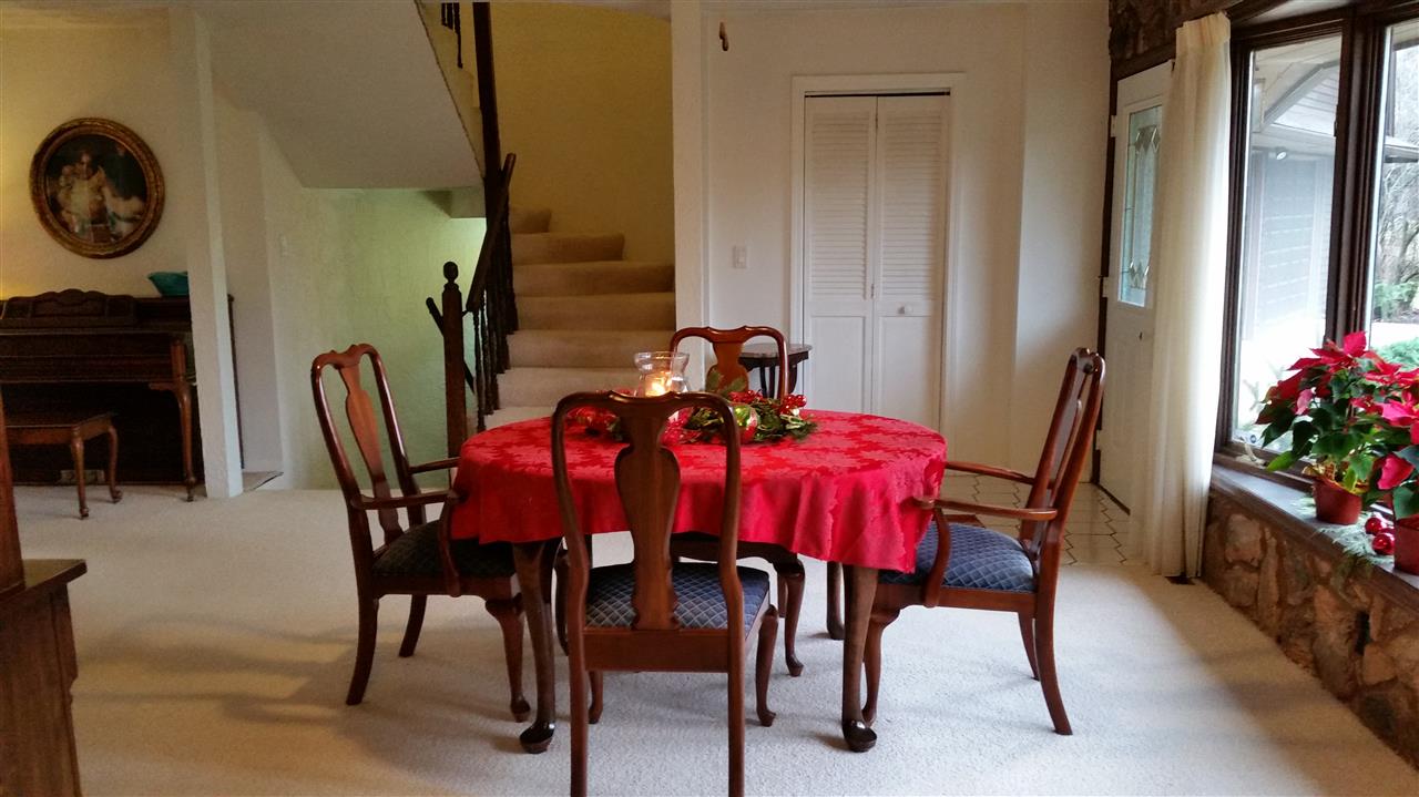 353 Cummings Road Caledonia, IL 61011 - Photo 5 of 24 a view of a dining room with furniture and a chandelier
