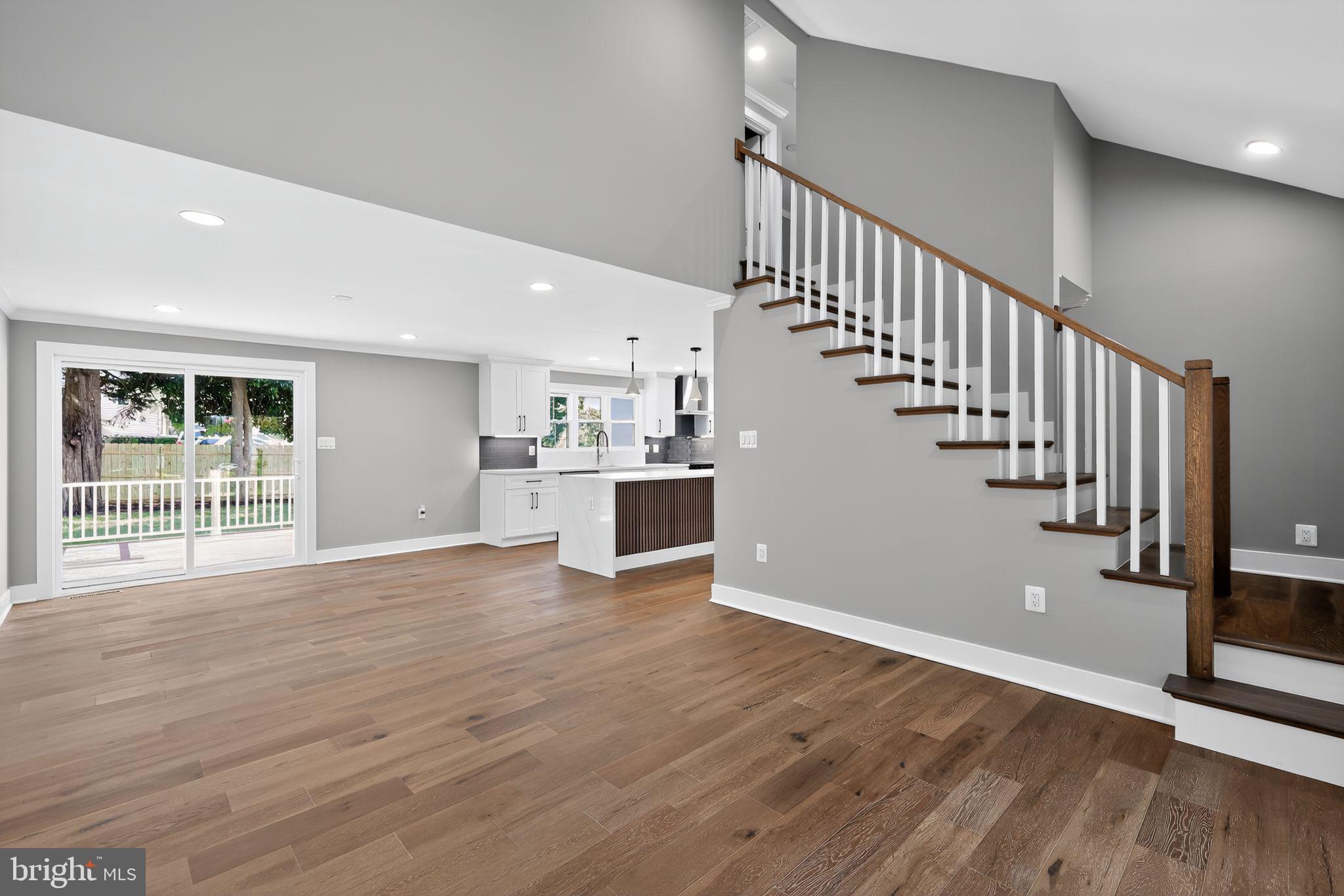 1 Tucker Street Annapolis, MD 21401 - Photo 14 of 46 a view of a hallway with wooden floor and staircase
