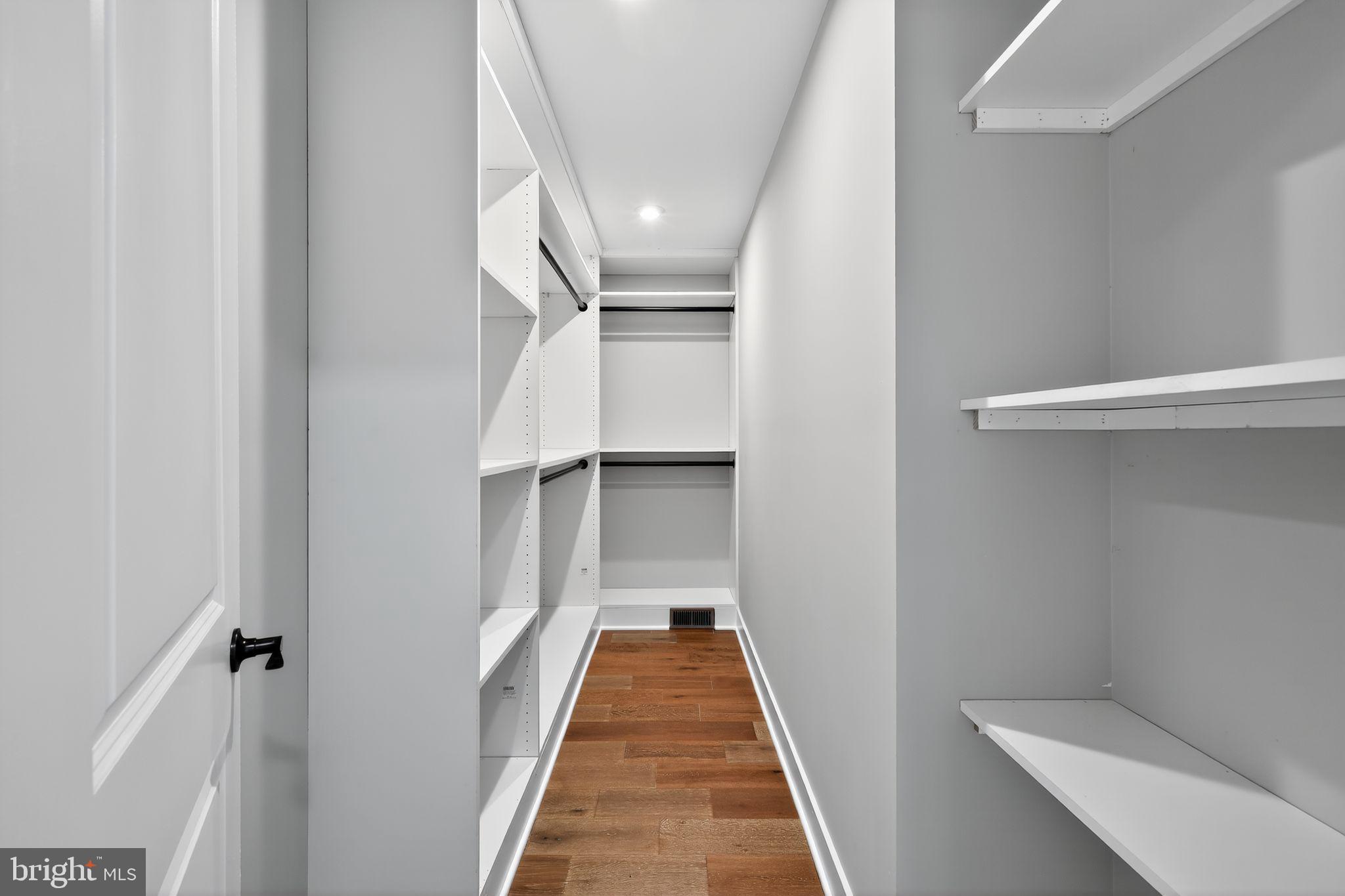 1 Tucker Street Annapolis, MD 21401 - Photo 24 of 46 a view of a hallway with wooden floor and staircase