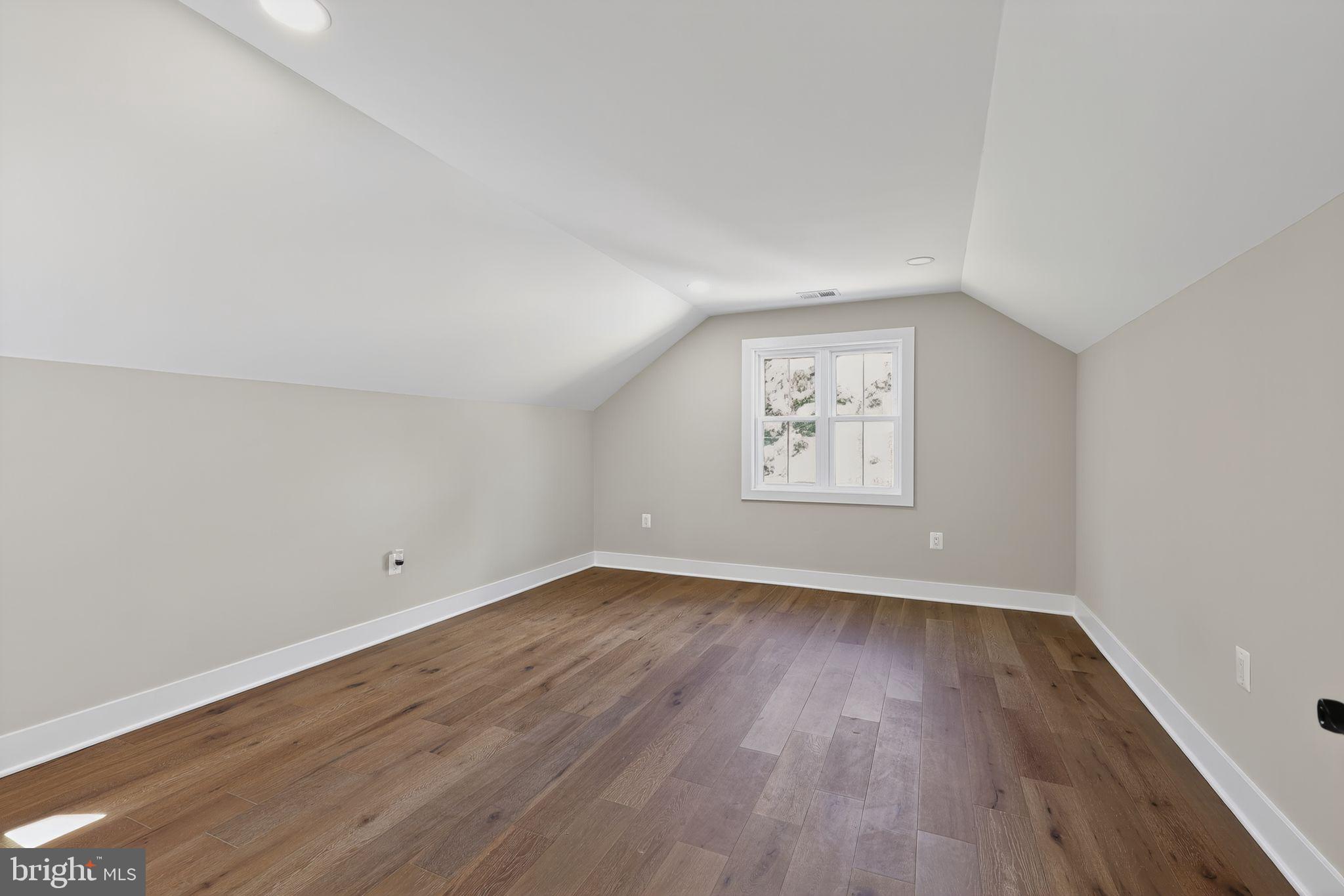 1 Tucker Street Annapolis, MD 21401 - Photo 25 of 46 an empty room with wooden floor and window