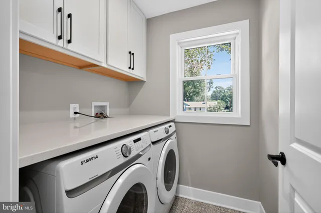 a view of an empty room with stairs