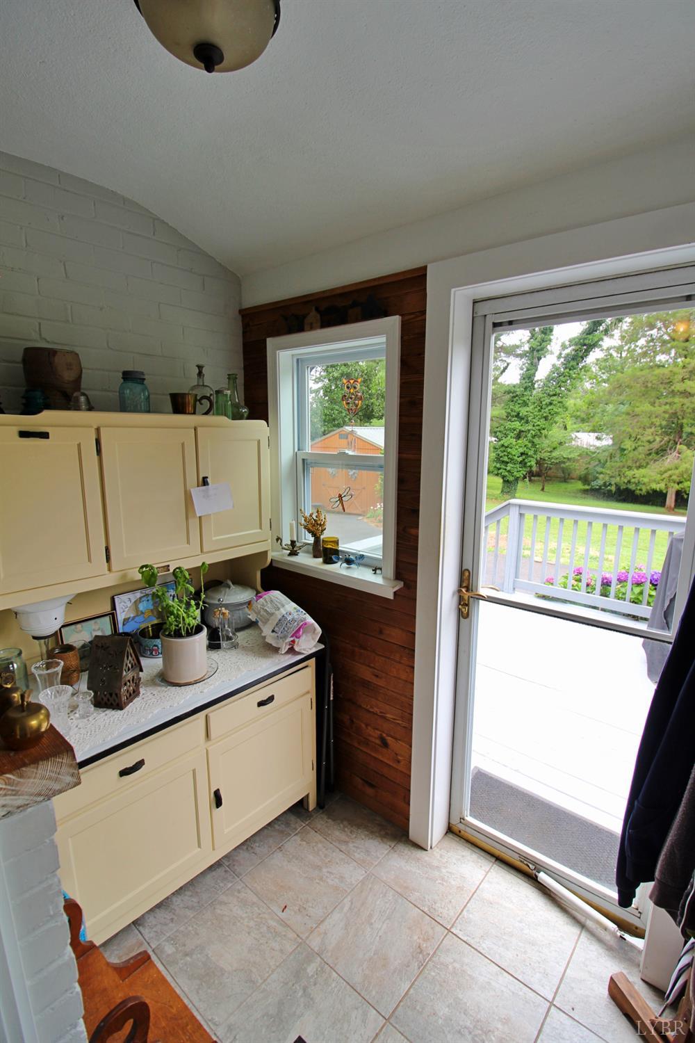 1538 Redfields Road Appomattox, VA 24522 - Photo 39 of 60 a bathroom with a granite countertop sink and a mirror