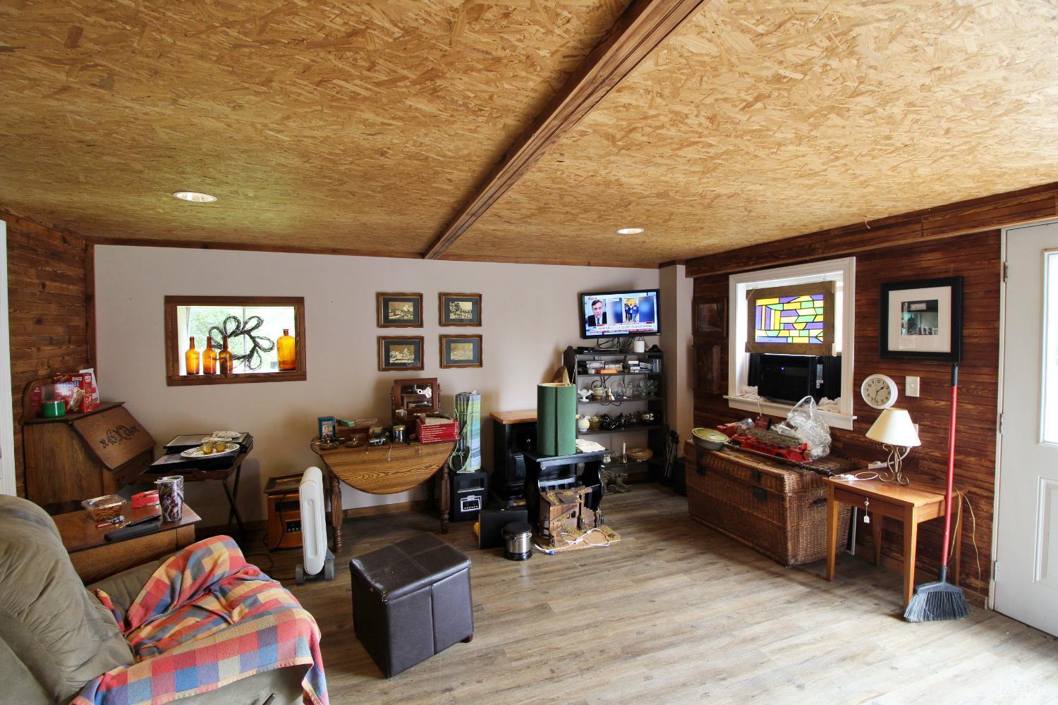 1538 Redfields Road Appomattox, VA 24522 - Photo 50 of 60 a living room with furniture and wooden floor