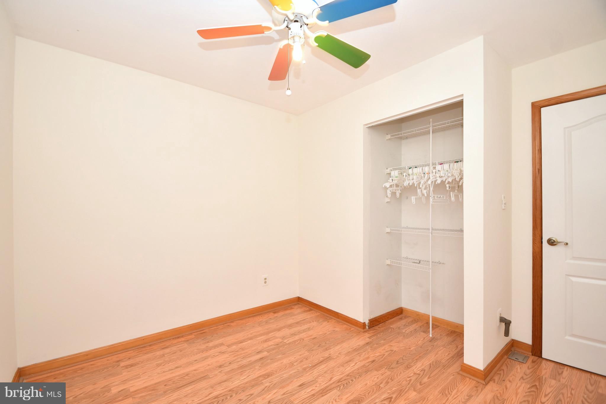 202 Sandhill Road Baltimore, MD 21221 - Photo 18 of 30 a view of empty room with wooden floor
