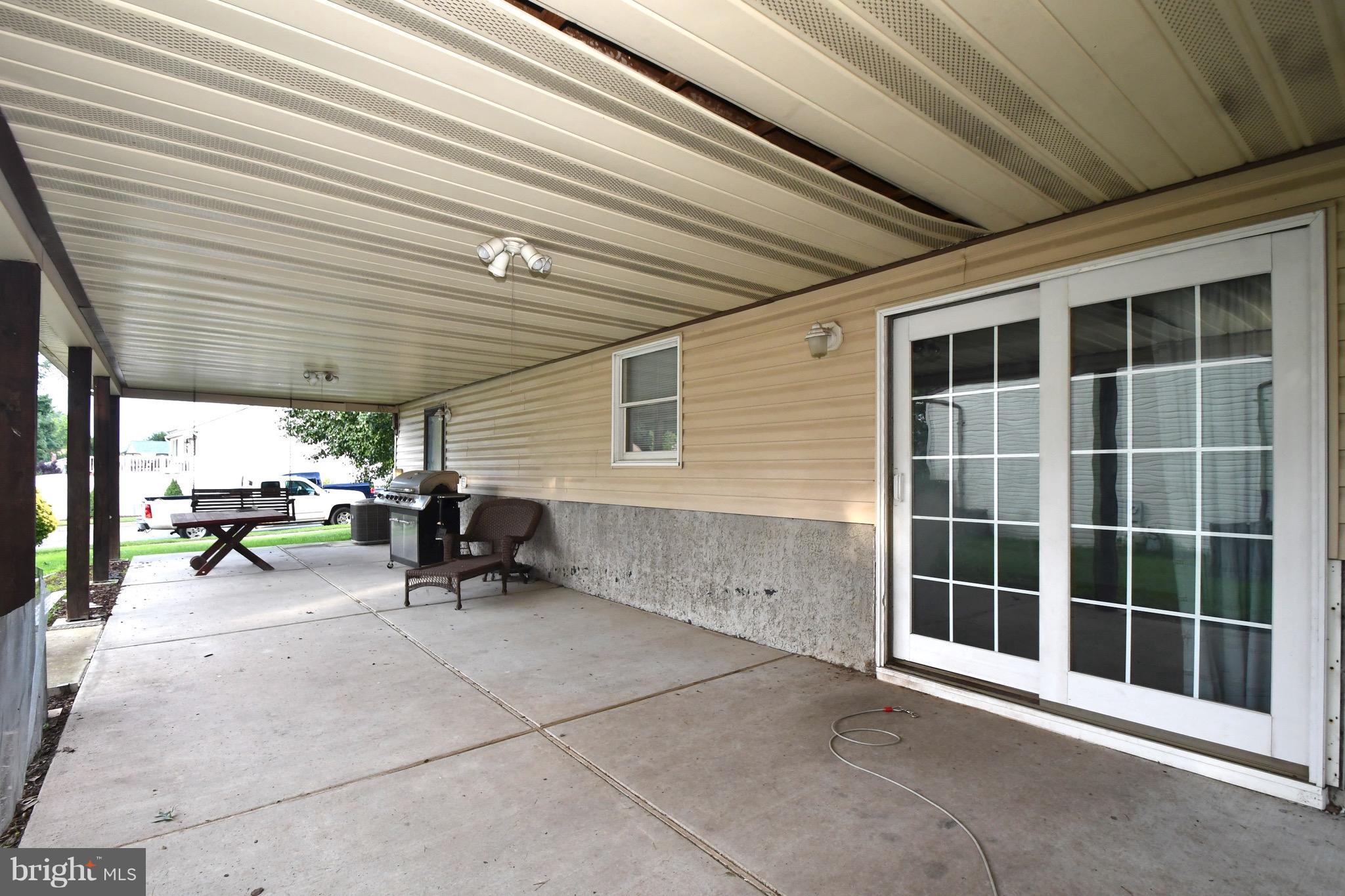 202 Sandhill Road Baltimore, MD 21221 - Photo 21 of 30 a view of a garage with chairs