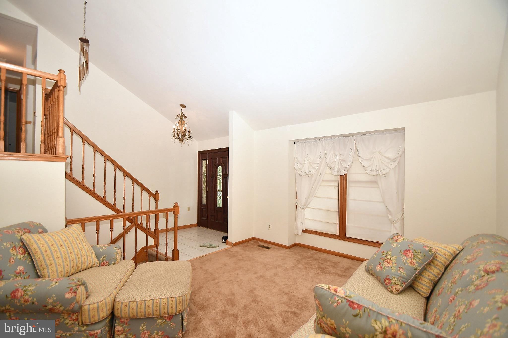 202 Sandhill Road Baltimore, MD 21221 - Photo 8 of 30 a bedroom with furniture and a window