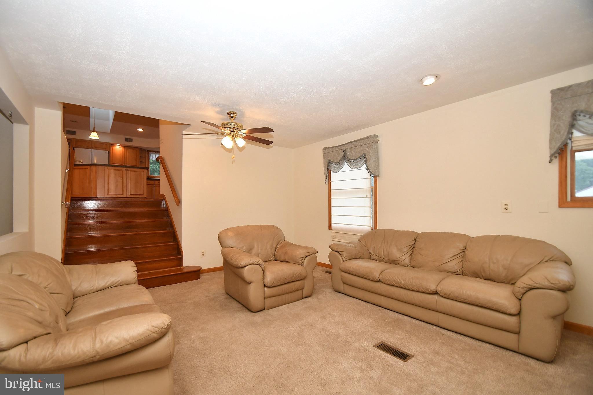 202 Sandhill Road Baltimore, MD 21221 - Photo 9 of 30 a living room with furniture and a window