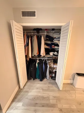 a view of a walk in closet