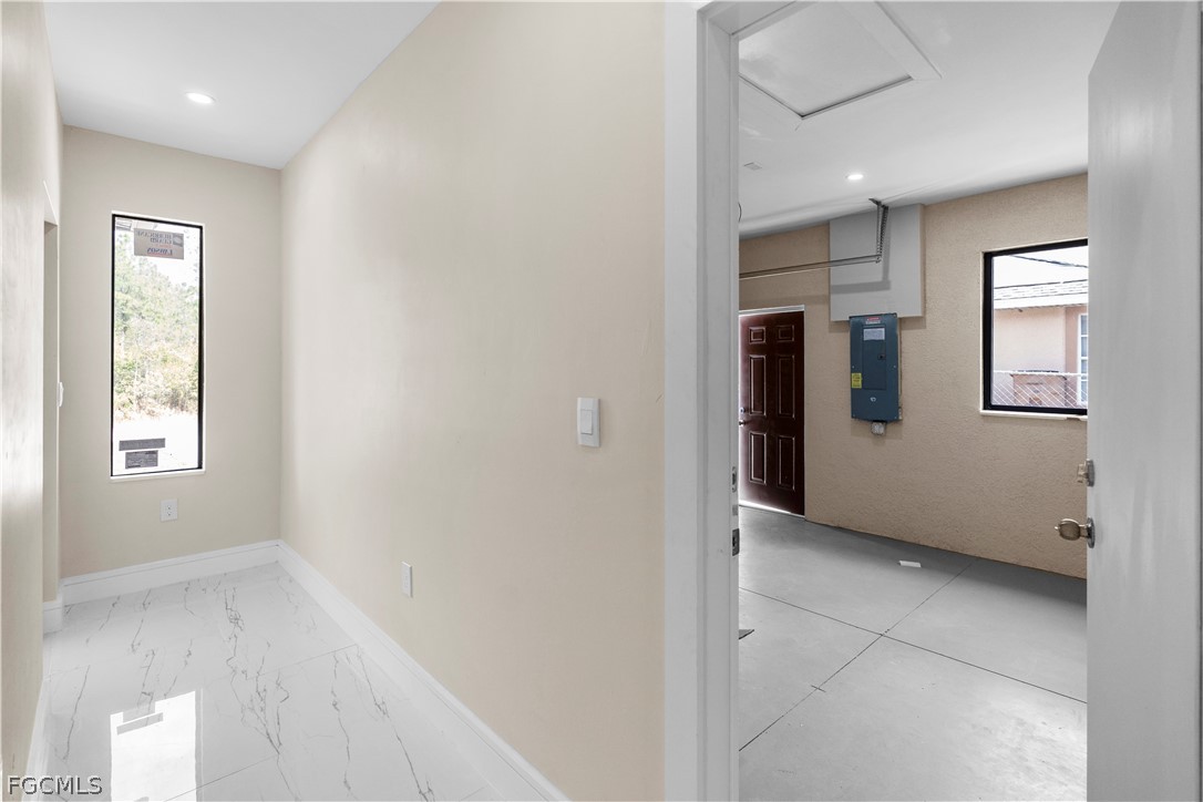 526 Knapp Street Lehigh Acres, FL 33974 - Photo 13 of 37 an empty room with windows and closet