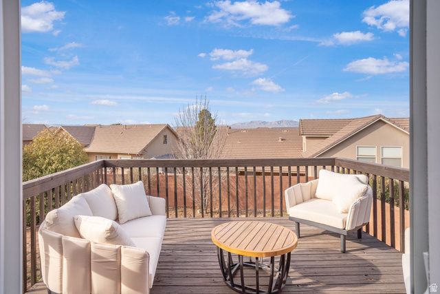 1570 South Rio Virgin Drive Washington, UT 84780 - Photo 57 of 71 Wooden deck featuring an outdoor hangout area and a residential view