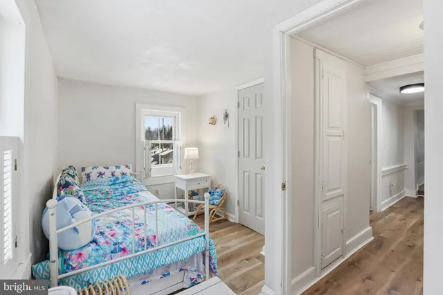 a view of a house with snow on the road