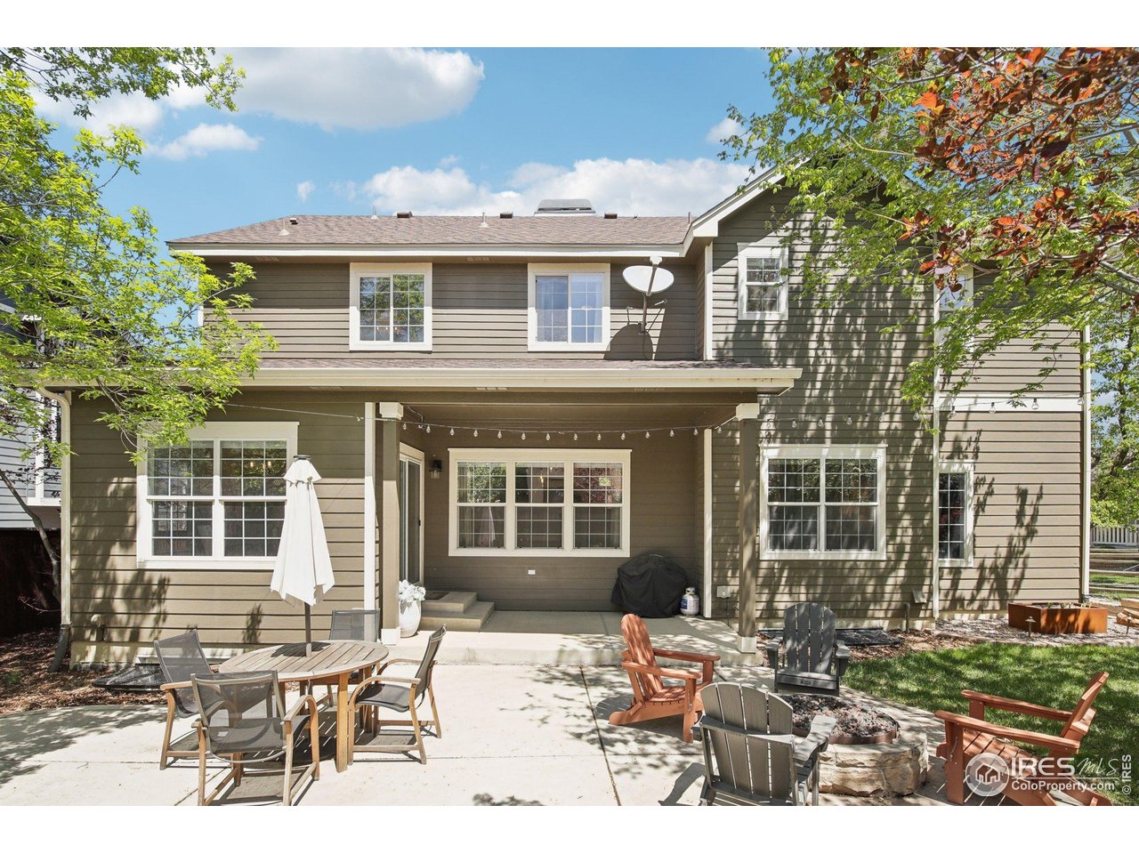 4109 Frederick Circle Longmont, CO 80503 - Photo 33 of 40 a view of a patio with table and chairs and potted plants