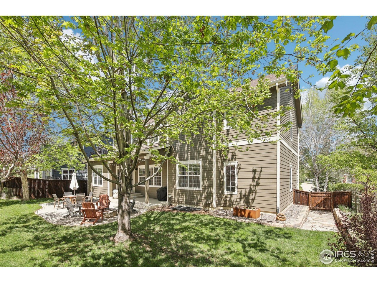 4109 Frederick Circle Longmont, CO 80503 - Photo 35 of 40 a view of a backyard with plants