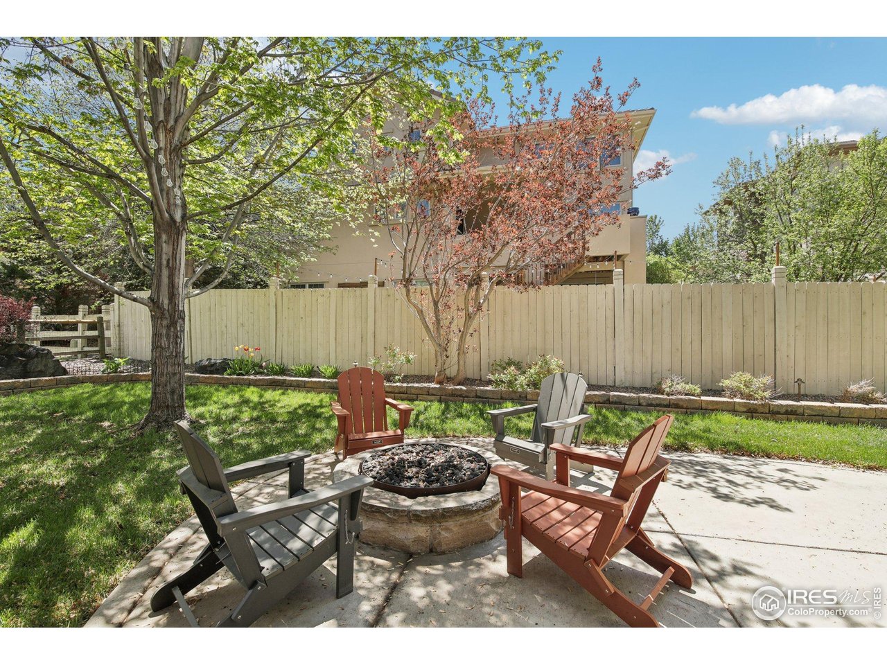 4109 Frederick Circle Longmont, CO 80503 - Photo 36 of 40 a view of backyard with seating space and trees