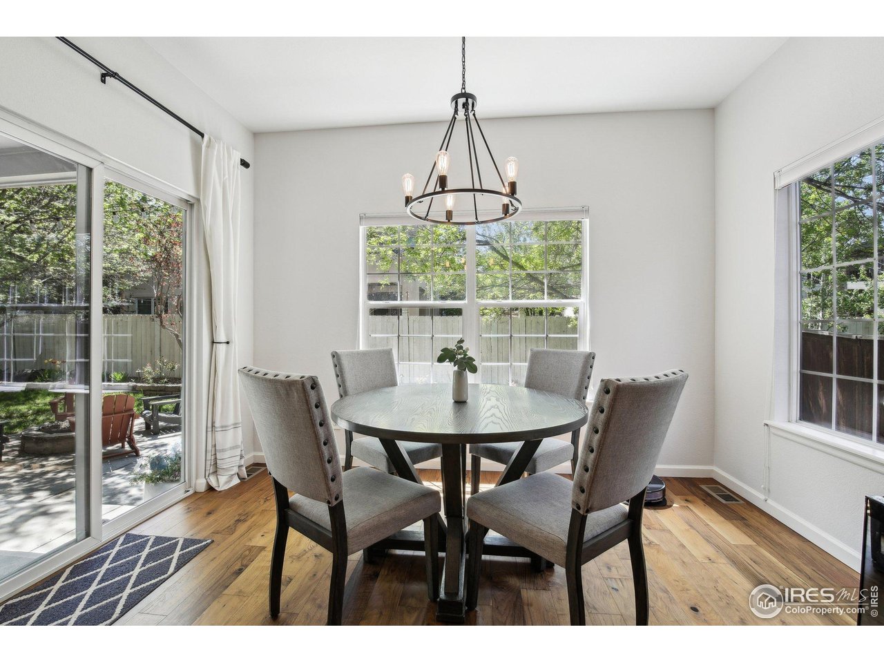 4109 Frederick Circle Longmont, CO 80503 - Photo 10 of 40 a view of a dining room with furniture window and outside view