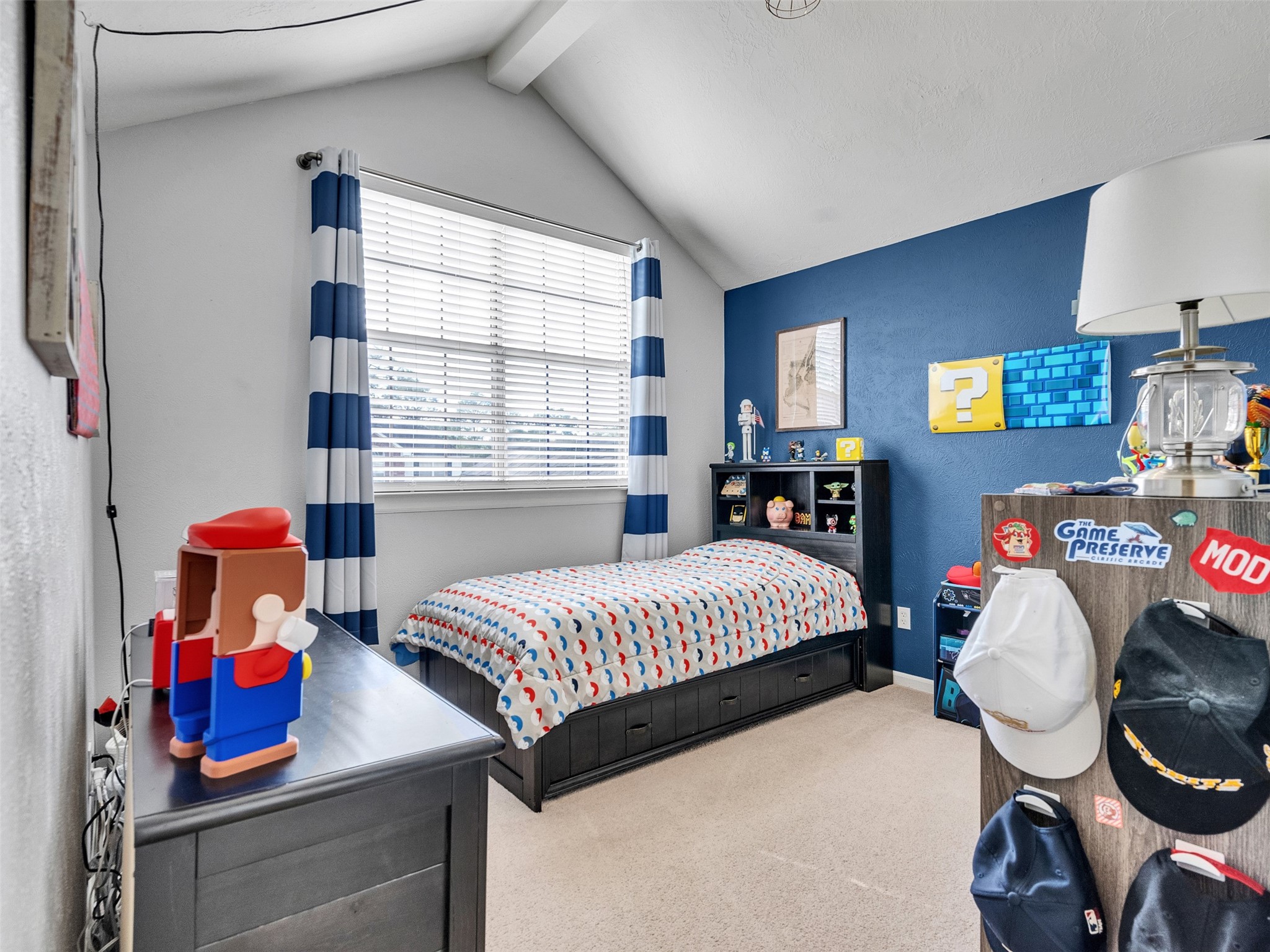 14219 Whitlock Drive Houston, TX 77062 - Photo 27 of 49 a bedroom with a bed and wooden floor