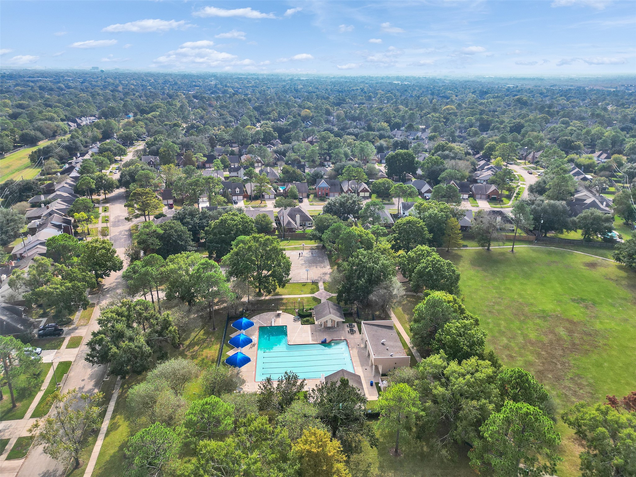 14219 Whitlock Drive Houston, TX 77062 - Photo 41 of 49 an aerial view of residential houses with outdoor space and swimming pool