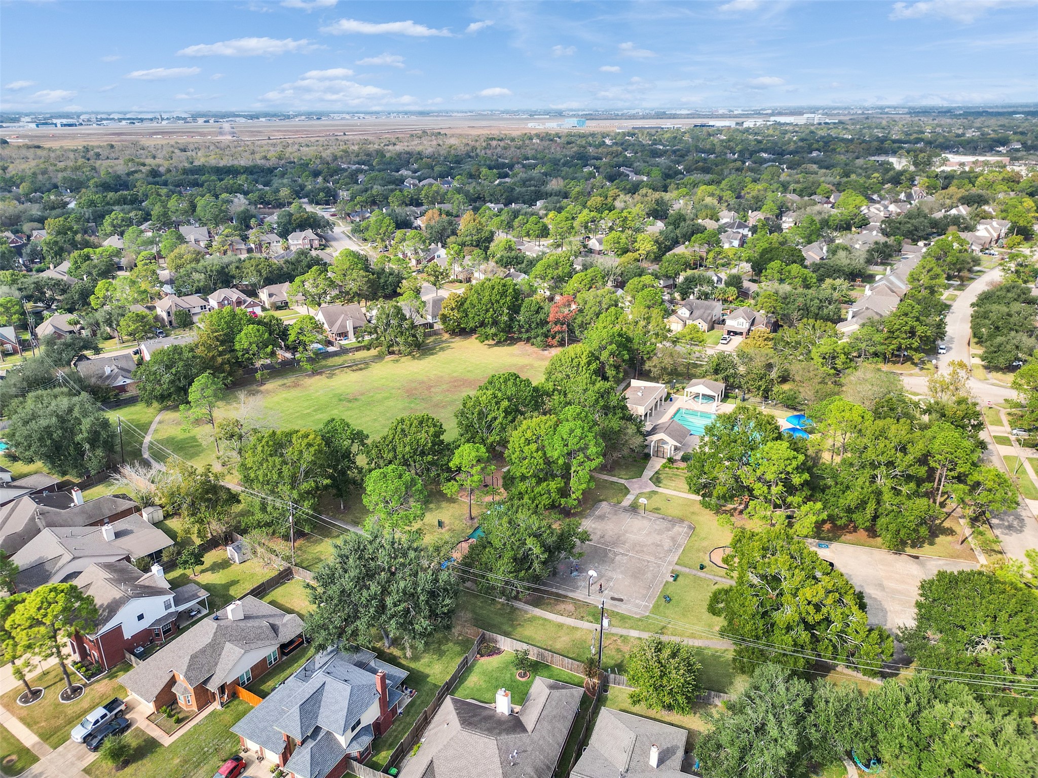 14219 Whitlock Drive Houston, TX 77062 - Photo 42 of 49 an aerial view of residential houses with outdoor space and trees