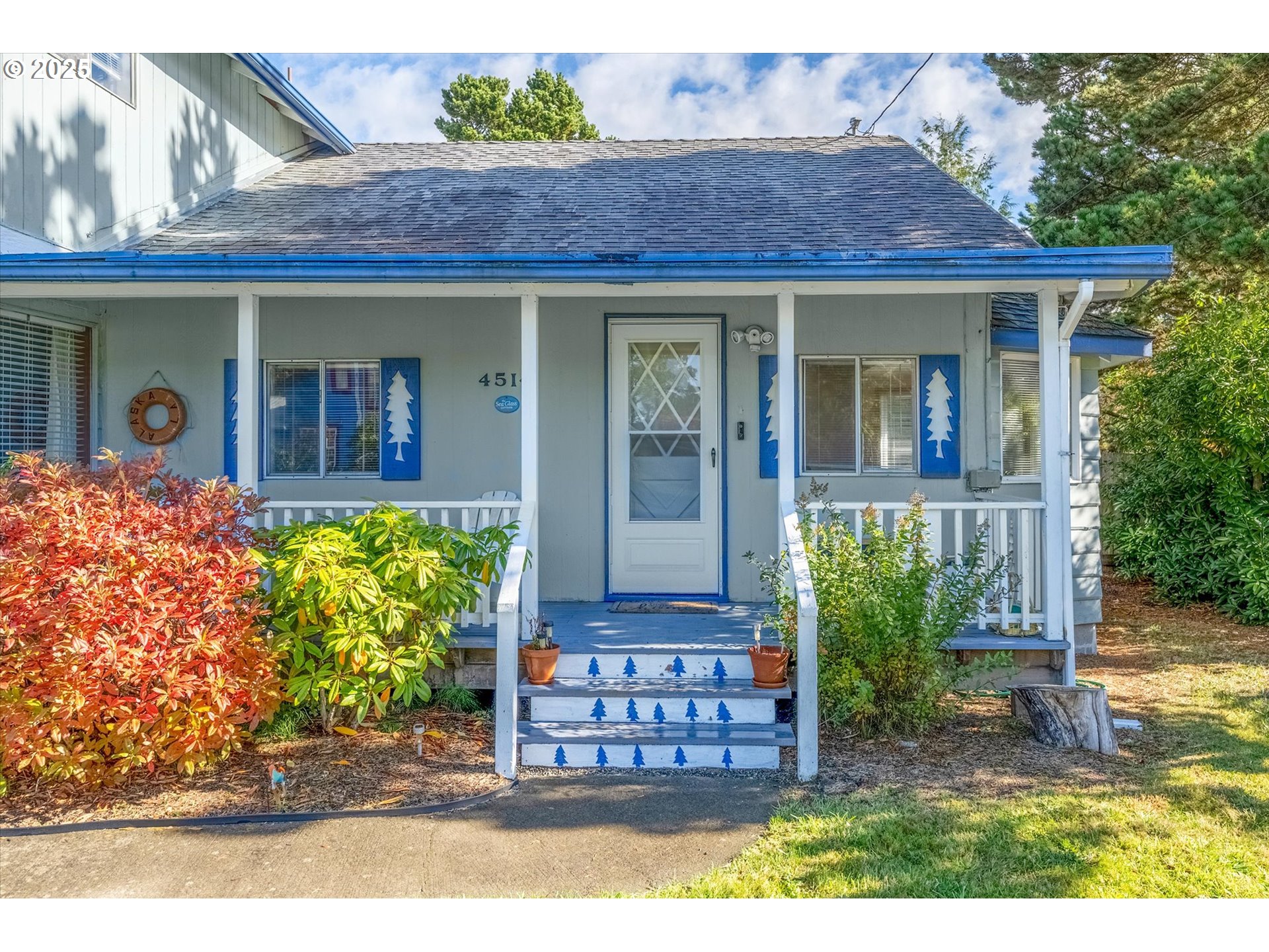 4514 L Place Seaview, WA 98644 - Photo 1 of 47 a front view of a house with a porch