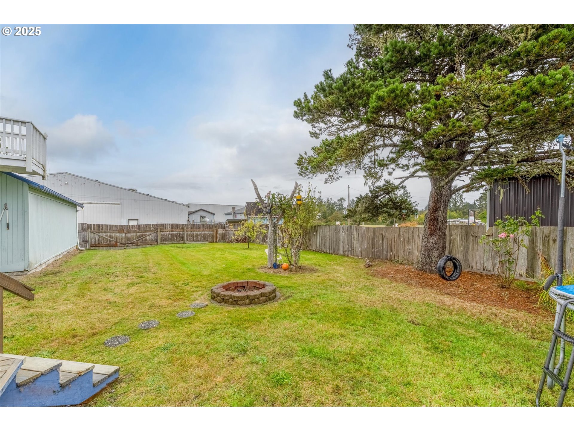 4514 L Place Seaview, WA 98644 - Photo 36 of 47 a view of a swimming pool with an outdoor space