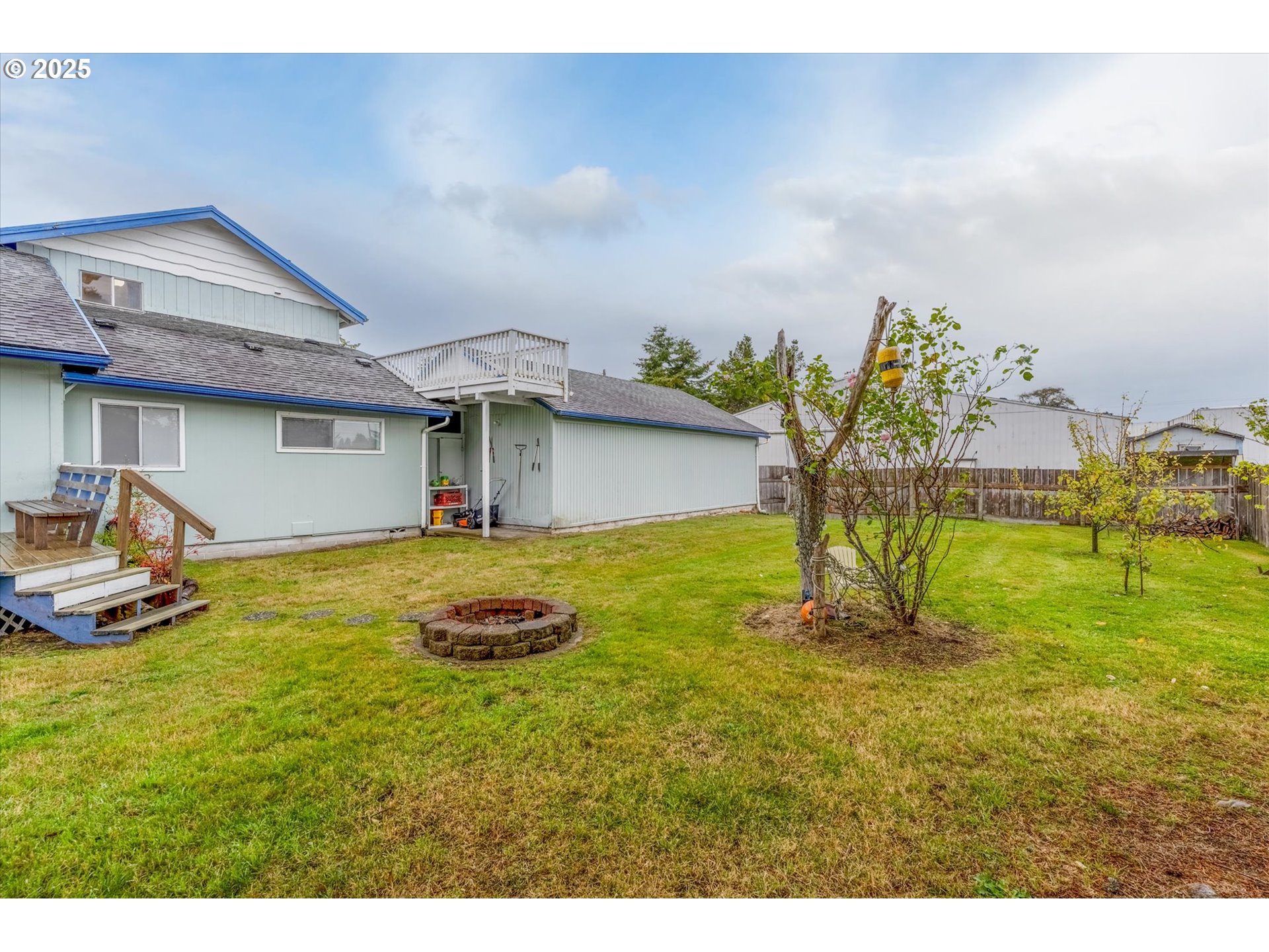 4514 L Place Seaview, WA 98644 - Photo 37 of 47 a swimming pool with outdoor seating and yard