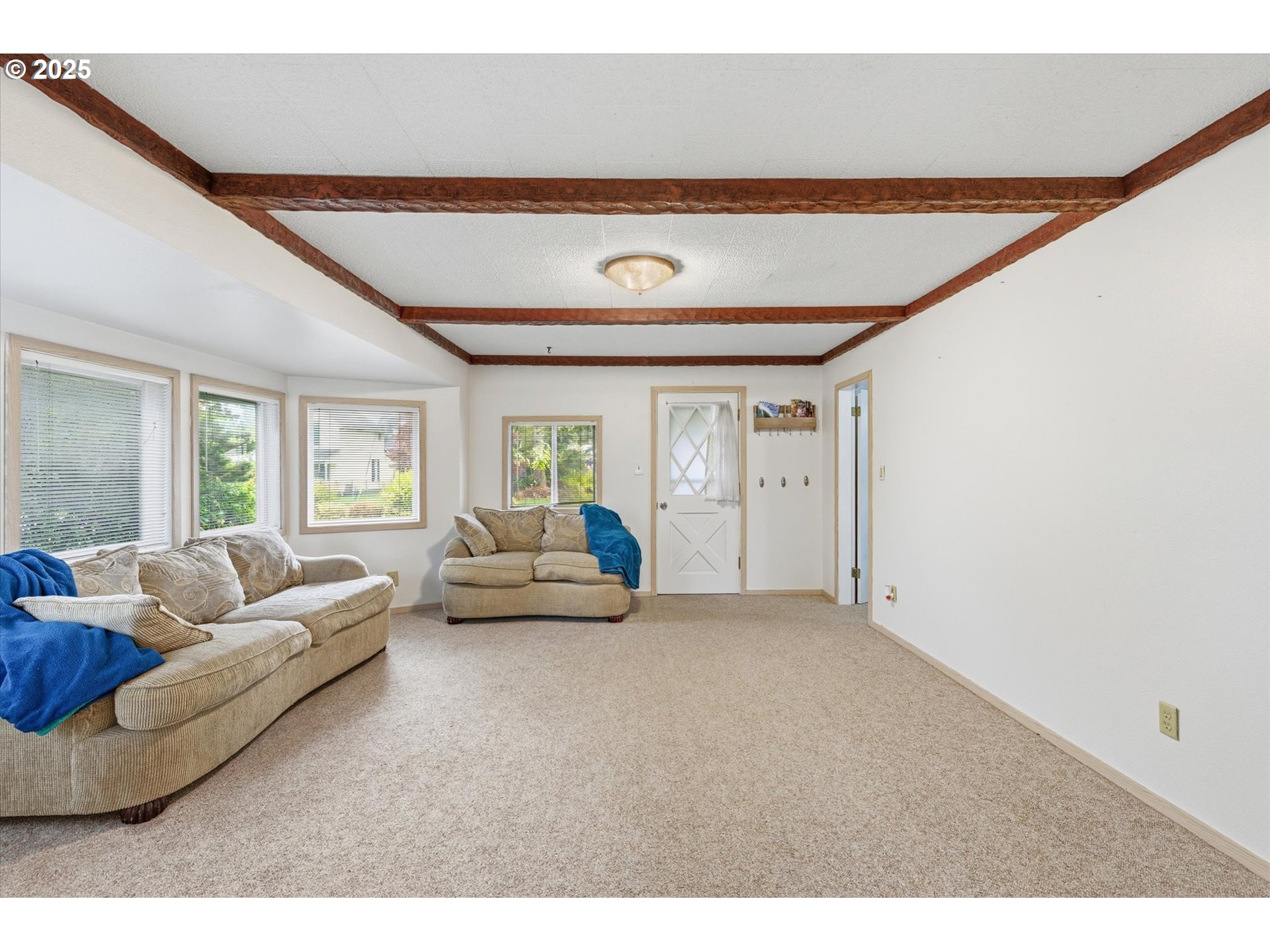 4514 L Place Seaview, WA 98644 - Photo 5 of 47 a living room with furniture and a large window